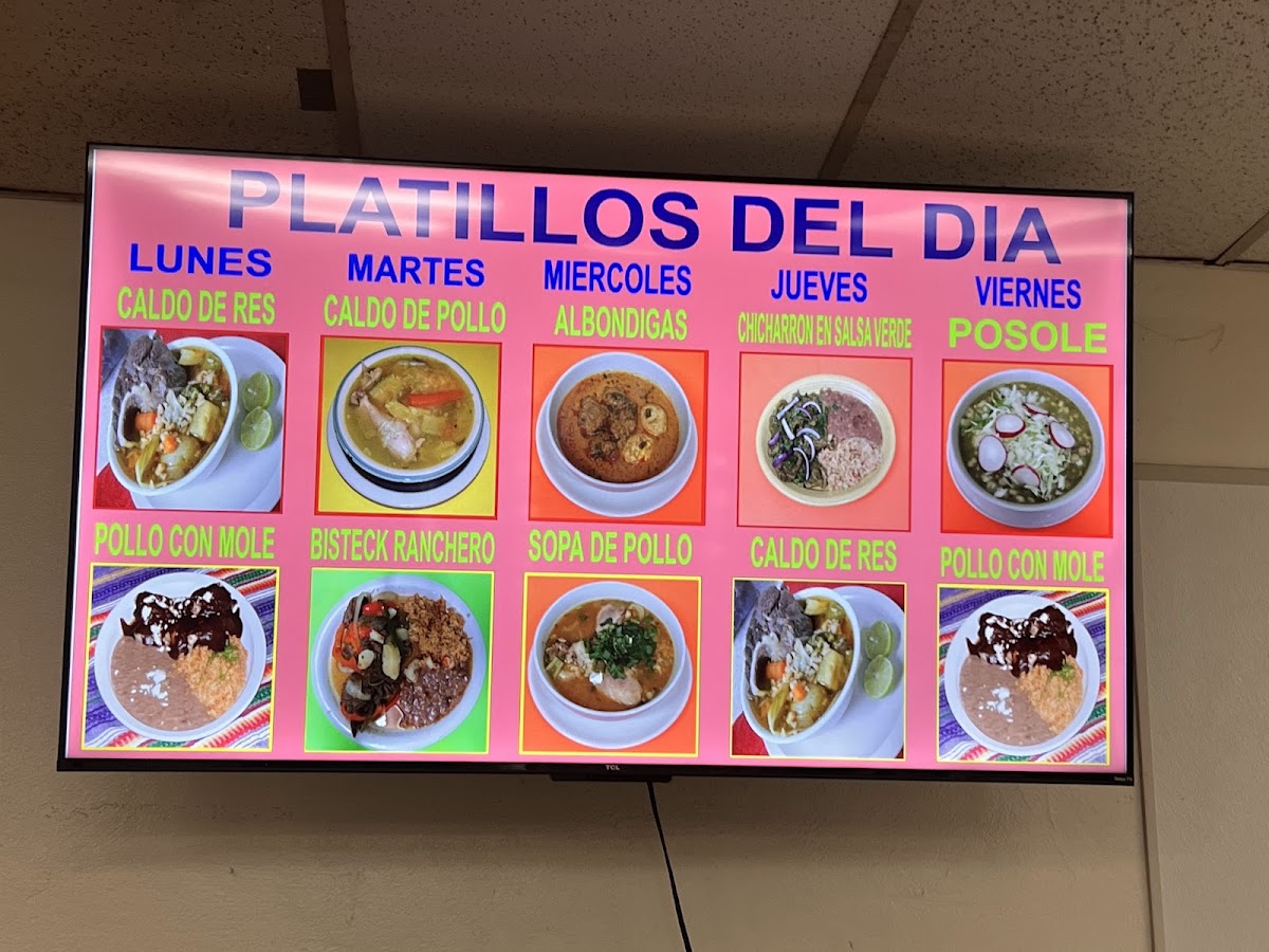Sabroso taco savor a mi tierra menu board