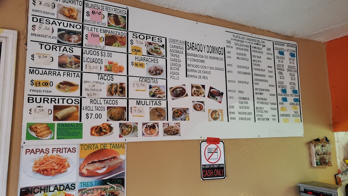 Sabroso taco savor a mi tierra menu board