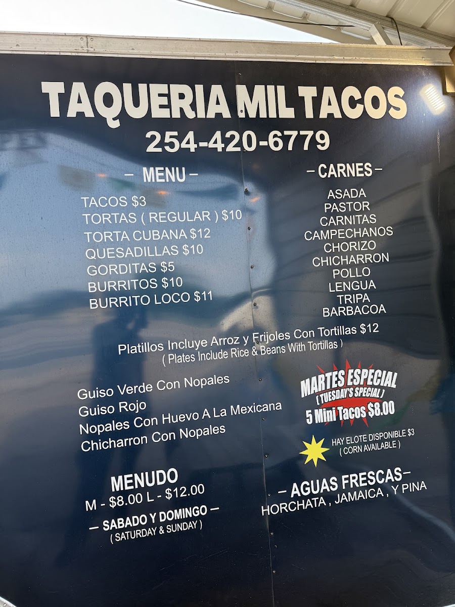 Taqueria mil tacos menu board