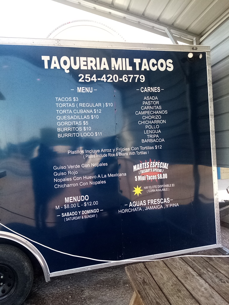 Taqueria mil tacos menu board