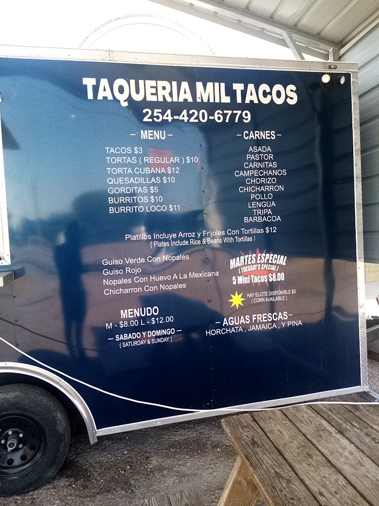 Taqueria mil tacos menu board