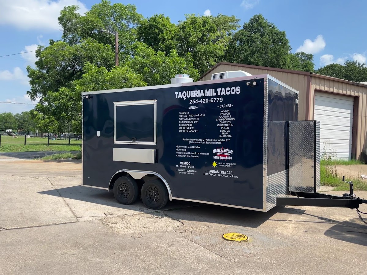 Taqueria mil tacos menu board
