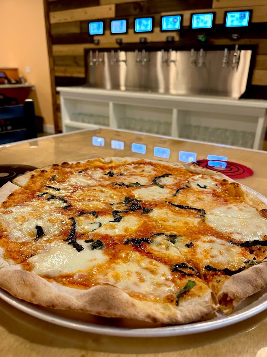 parker. Pizza (p. izza) New Haven style, thin, brick oven