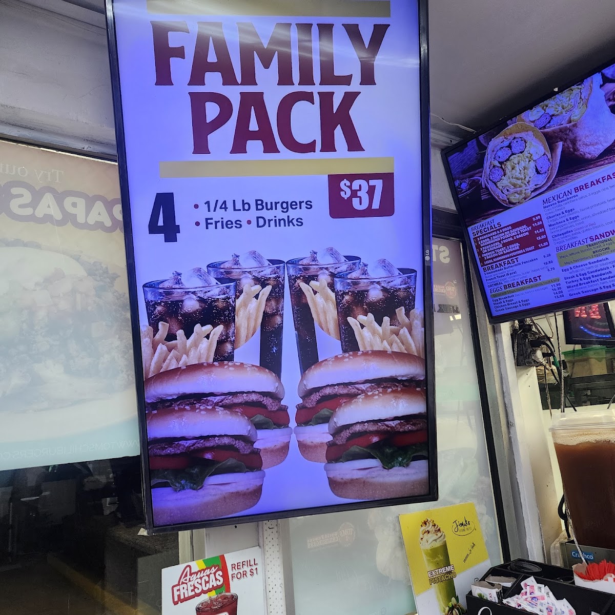 Tom's #1 World Famous Chili Burgers menu board