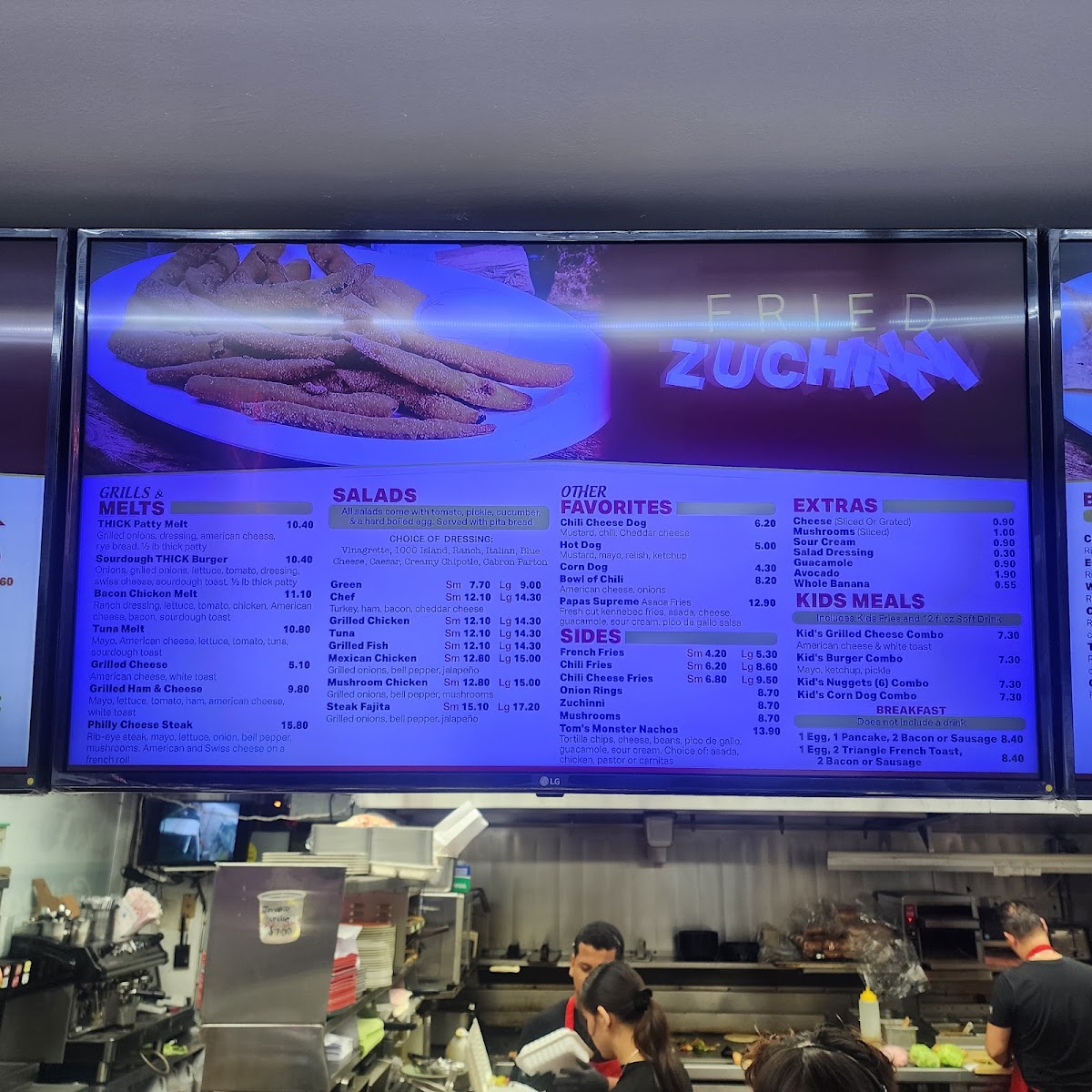 Tom's #1 World Famous Chili Burgers menu board