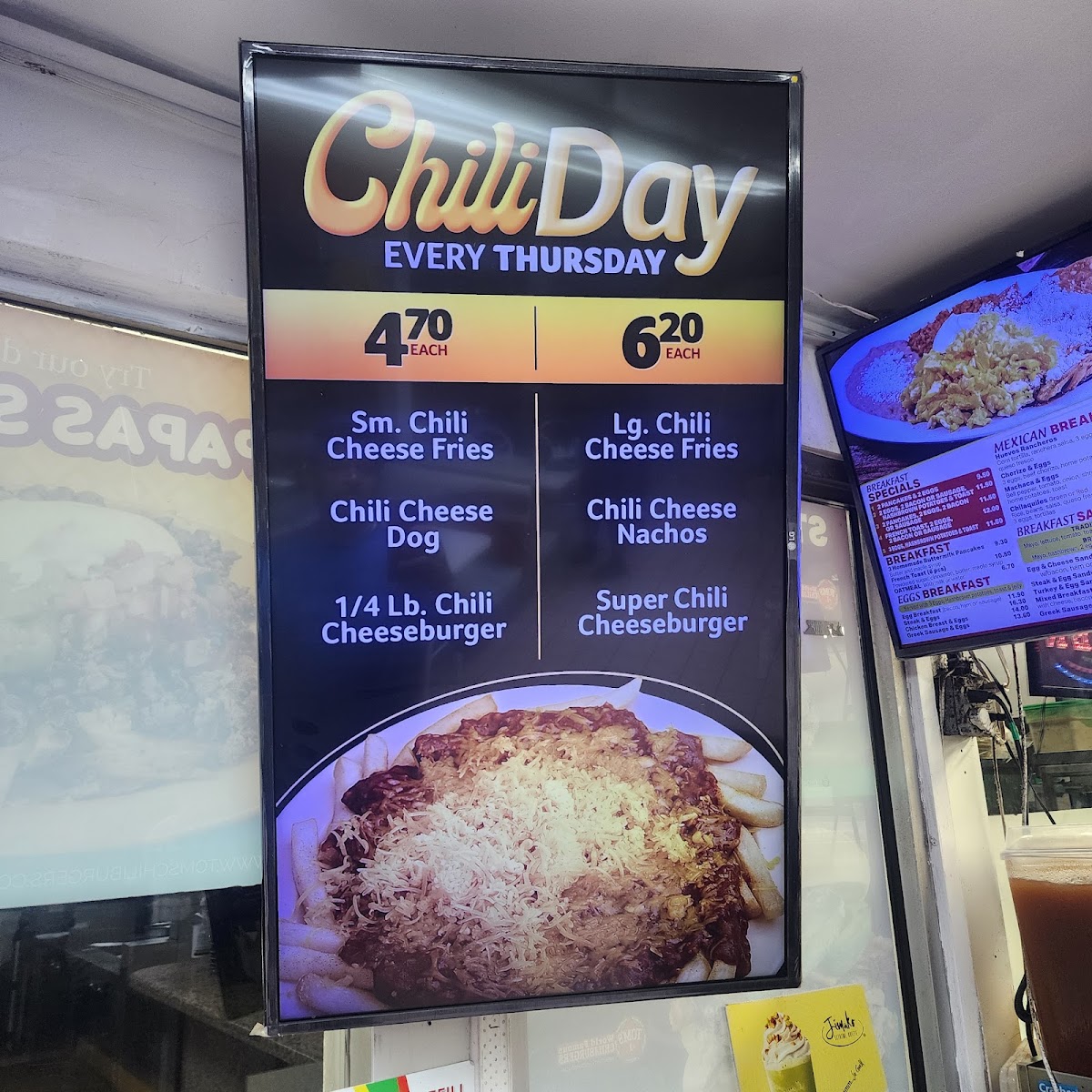 Tom's #1 World Famous Chili Burgers menu board
