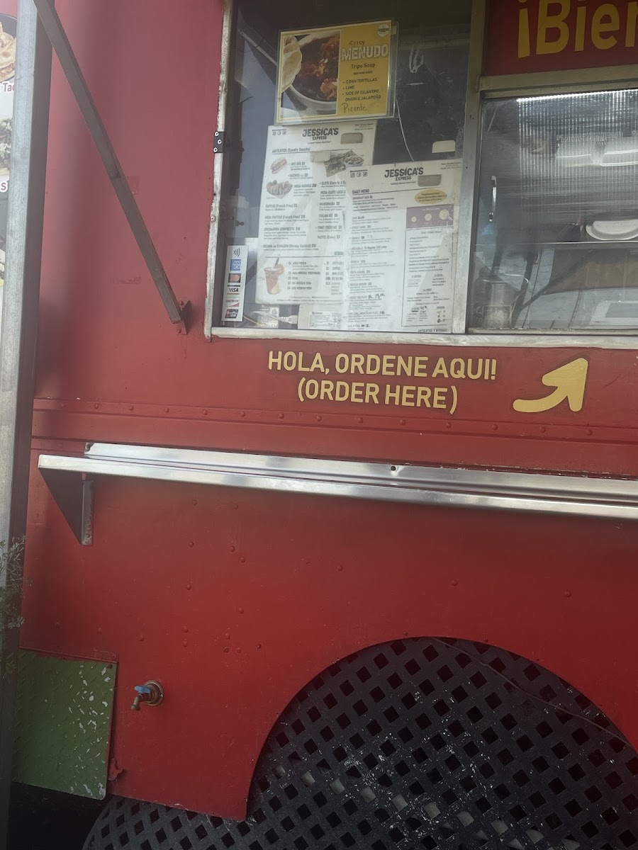 Taqueria Y Refresqueria menu board