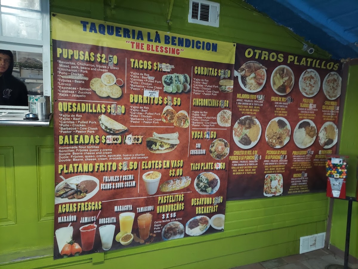 Tacos Y Pupusas menu board