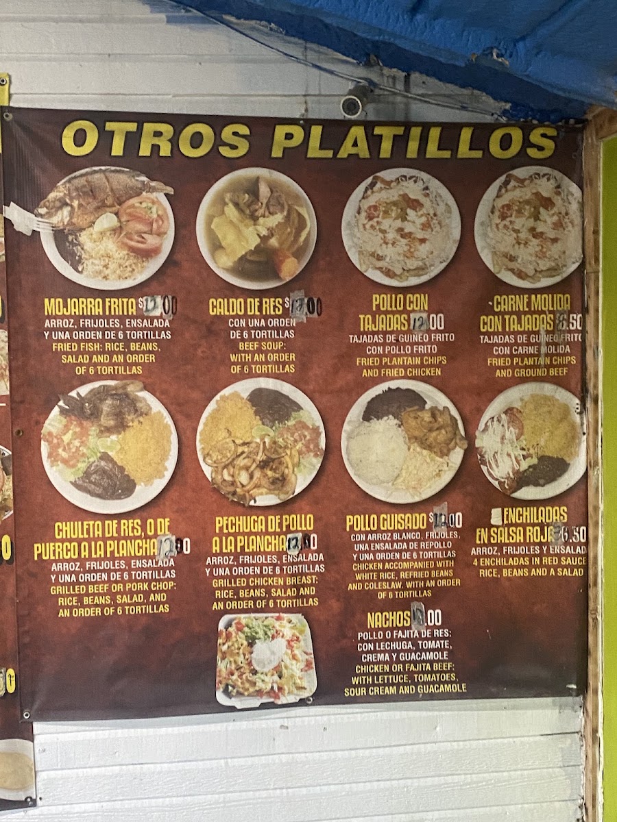 Tacos Y Pupusas menu board