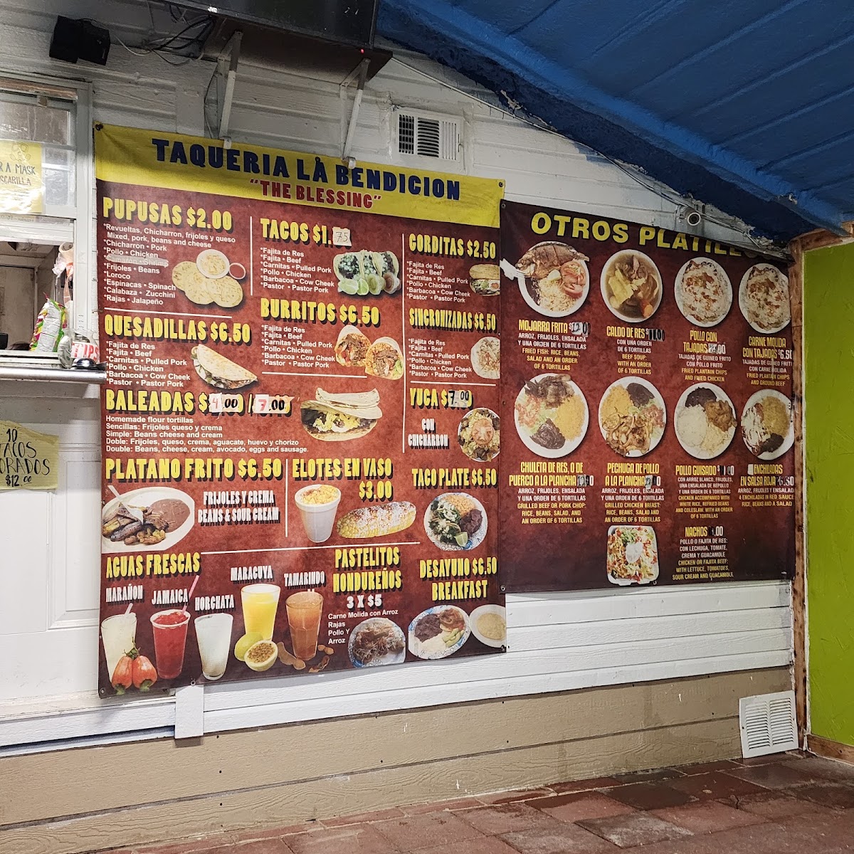 Tacos Y Pupusas menu board