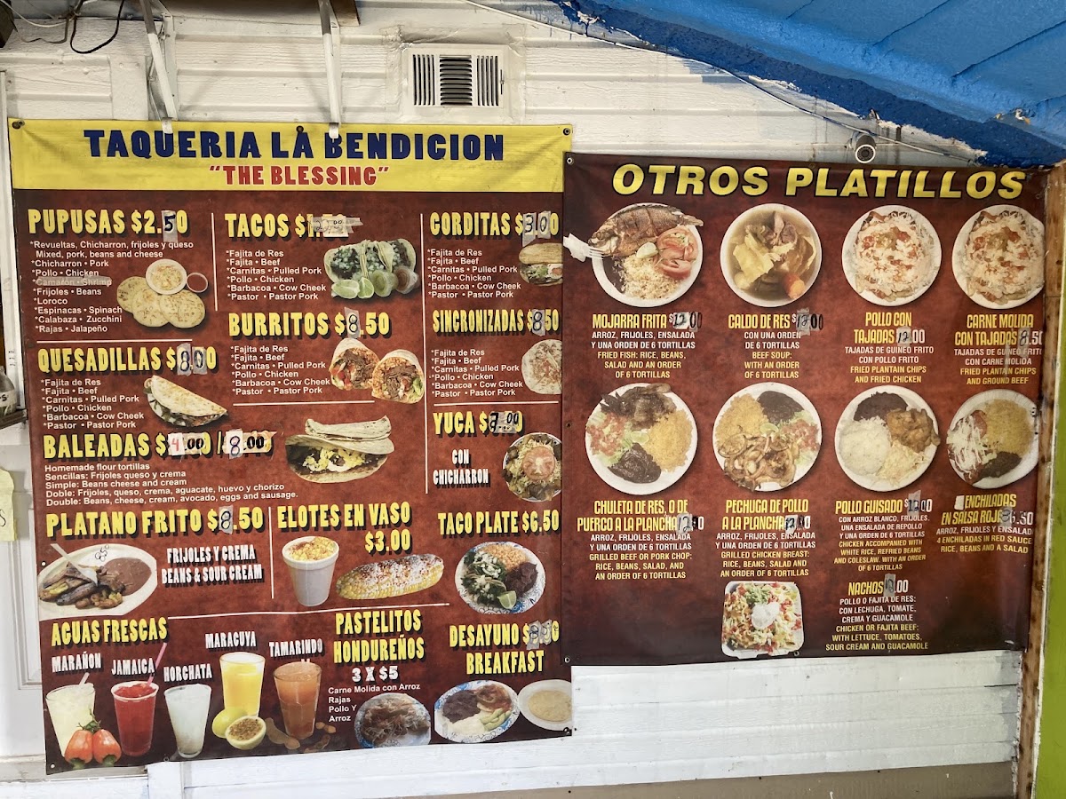 Tacos Y Pupusas menu board