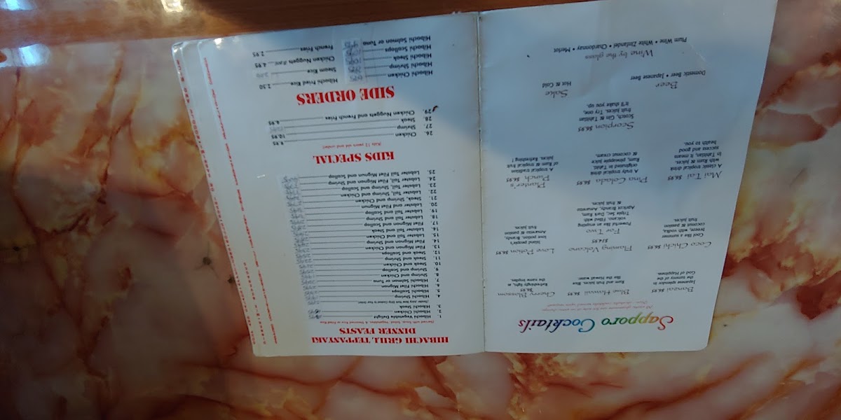 Sapporo Japanese Steak House menu board