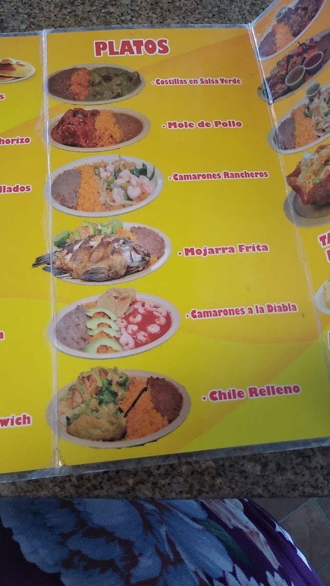 Tacos Y Mariscos El Primo menu board