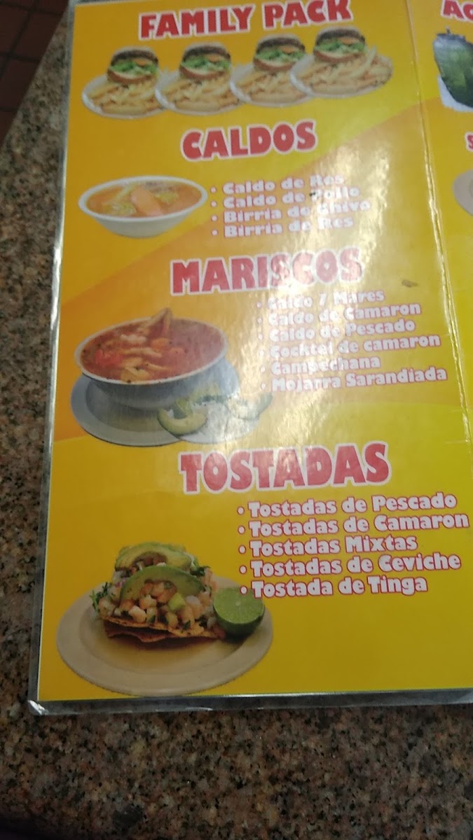 Tacos Y Mariscos El Primo menu board