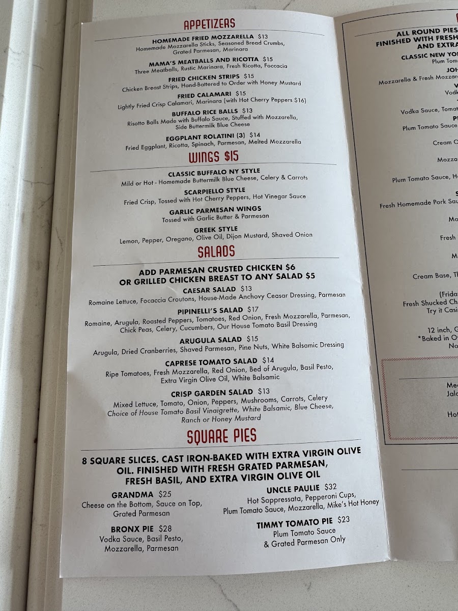 Pipinelli's Pizza Parlor menu board