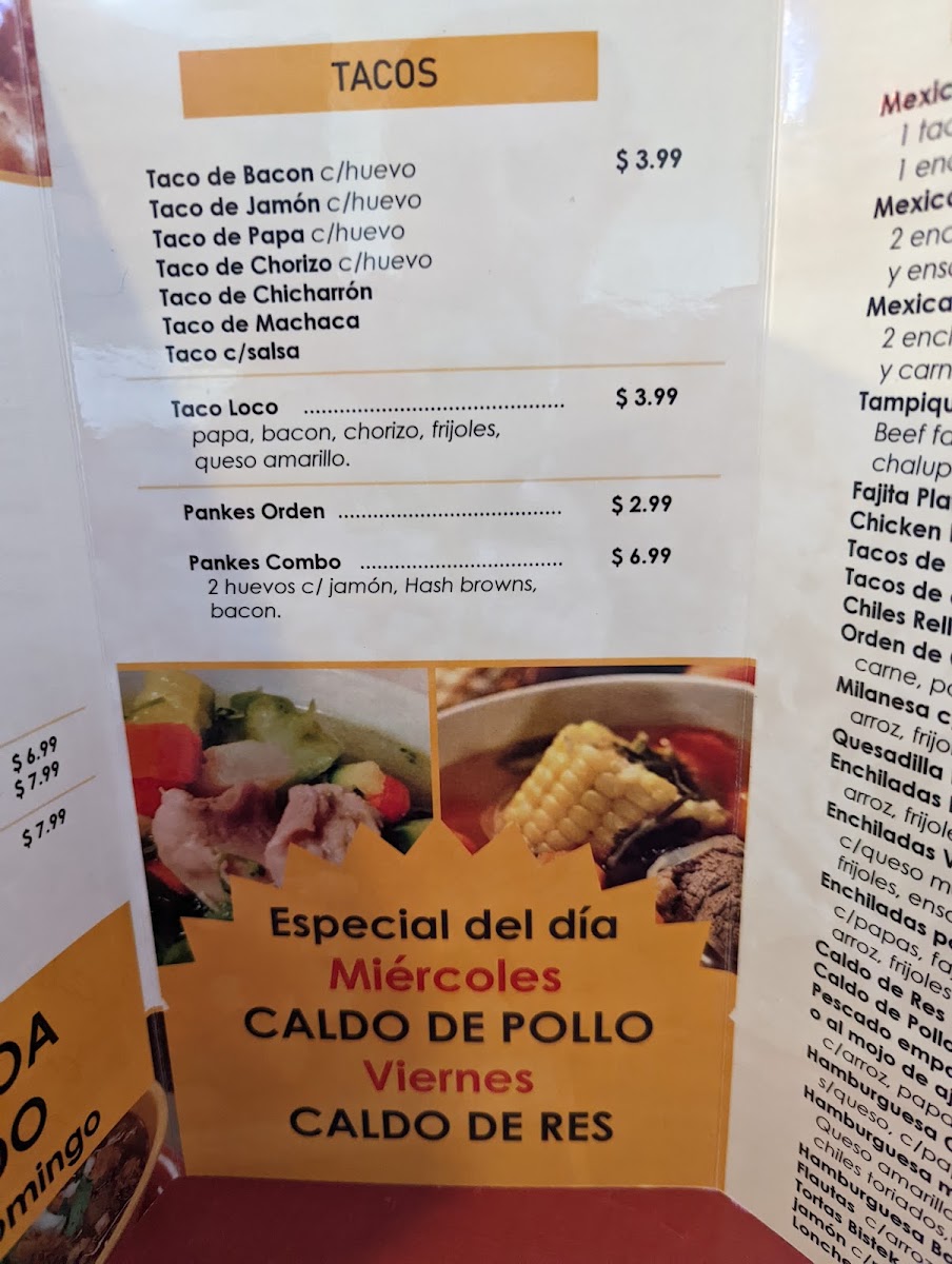 Antojitos Mi Reynita menu board