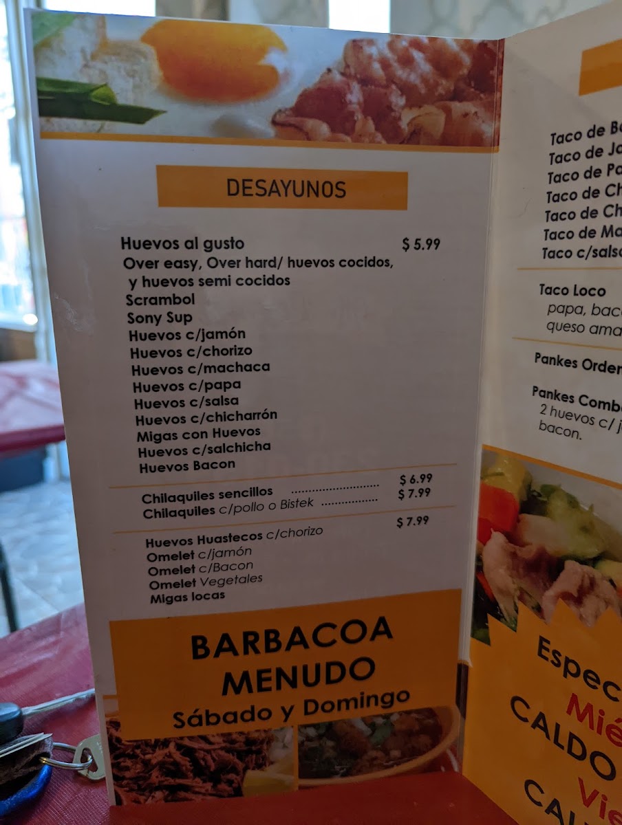 Antojitos Mi Reynita menu board