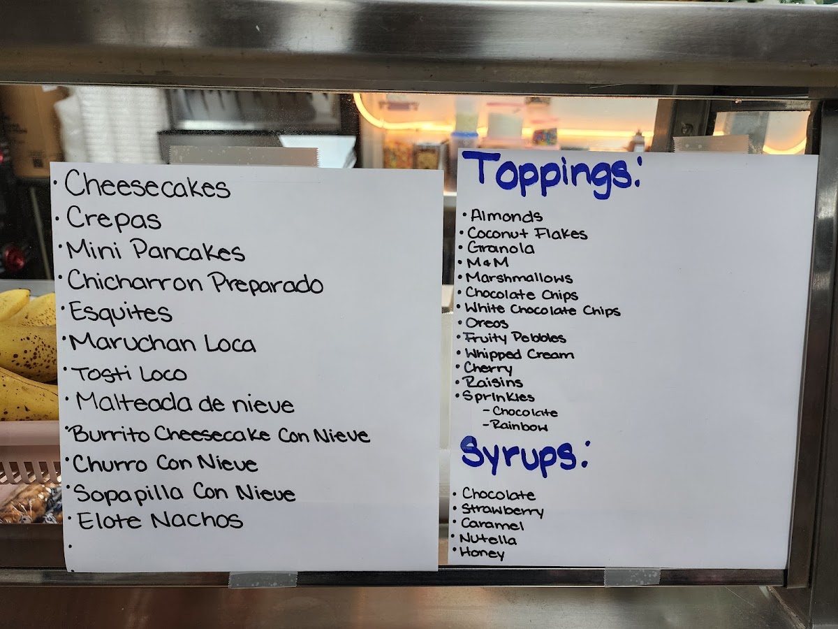 Los Agaves Mexican Restaurant y Mini Market menu board