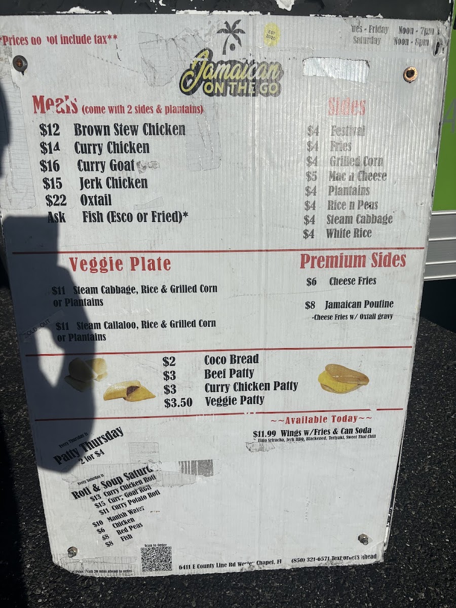 Jamaican On The Go Food Truck menu board
