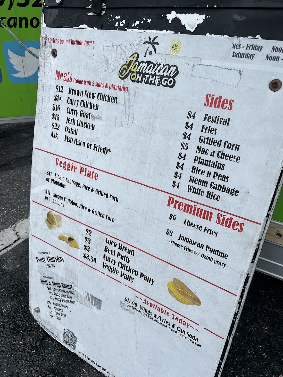 Jamaican On The Go Food Truck menu board