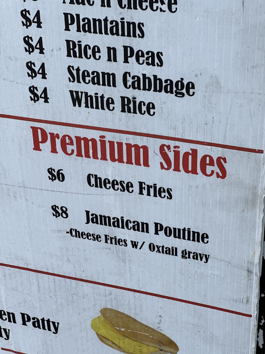 Jamaican On The Go Food Truck menu board