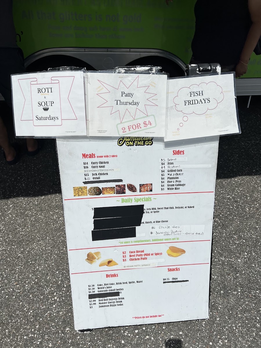 Jamaican On The Go Food Truck menu board