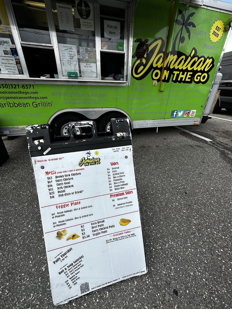 Jamaican On The Go Food Truck menu board