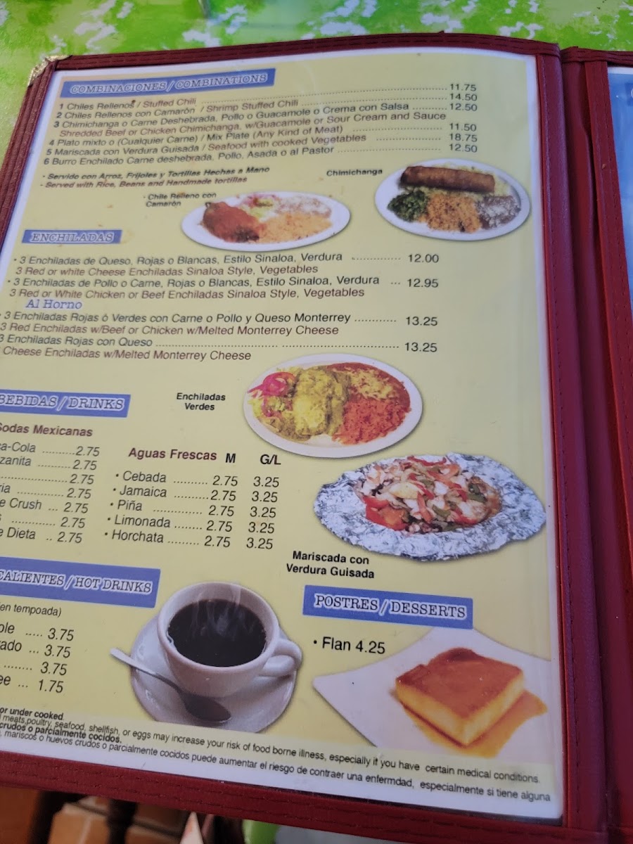 Tacos y Mariscos Sinaloa menu board