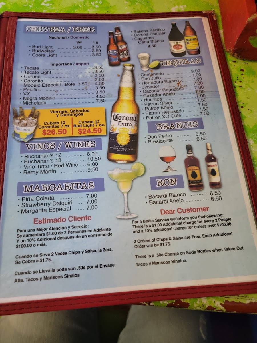 Tacos y Mariscos Sinaloa menu board