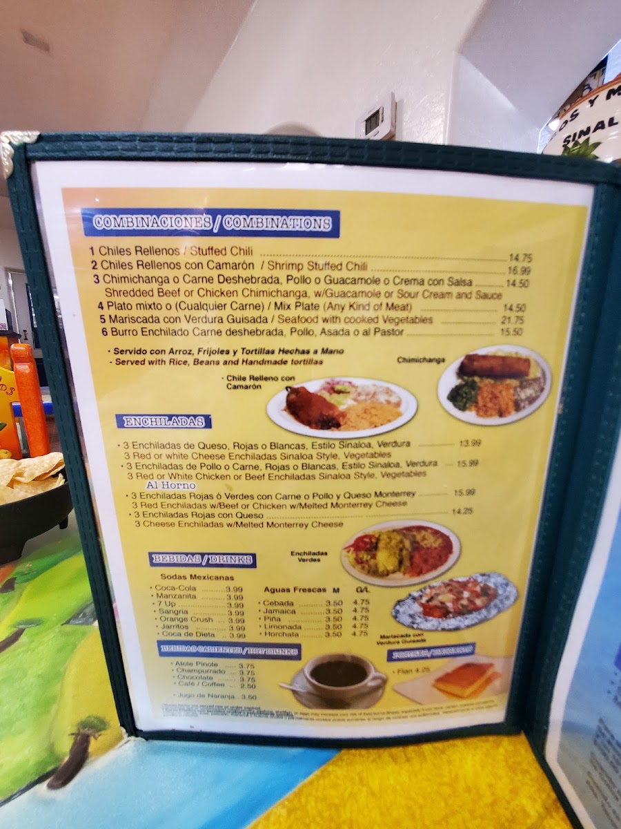 Tacos y Mariscos Sinaloa menu board