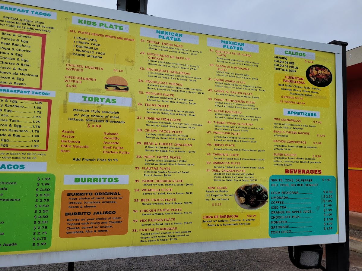 Taqueria Huentitan menu board