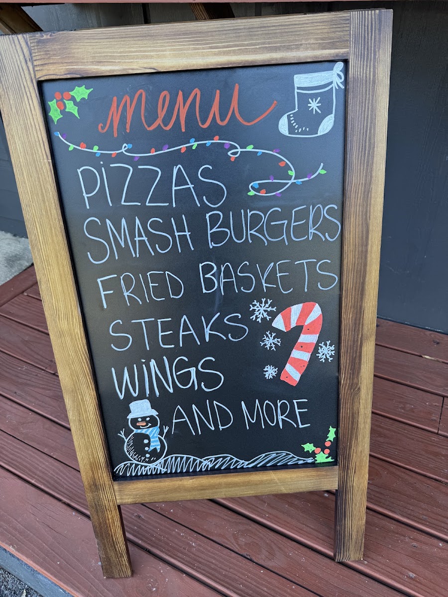 Paradise At The Outpost menu board