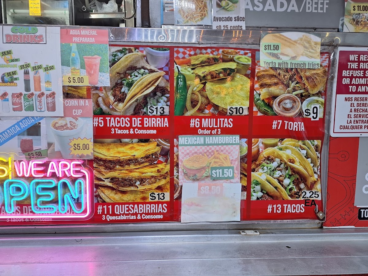 Taqueria La Chiva menu board