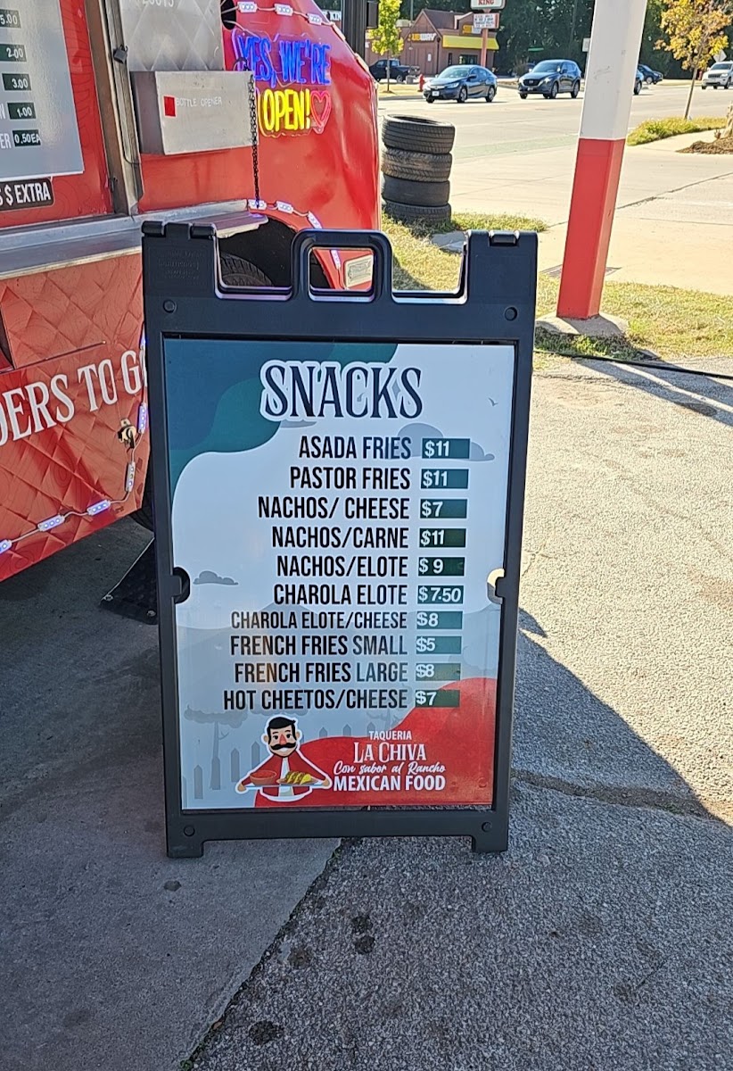Taqueria La Chiva menu board