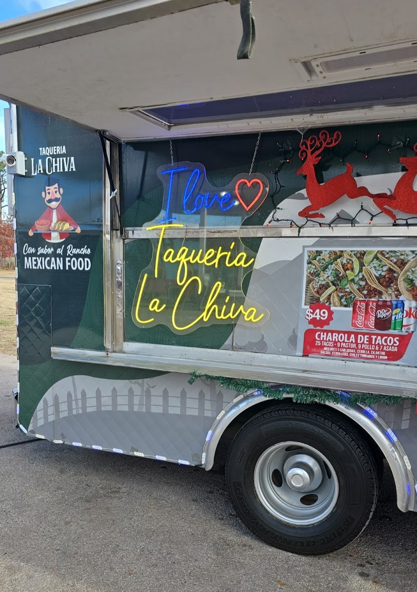 Taqueria La Chiva menu board