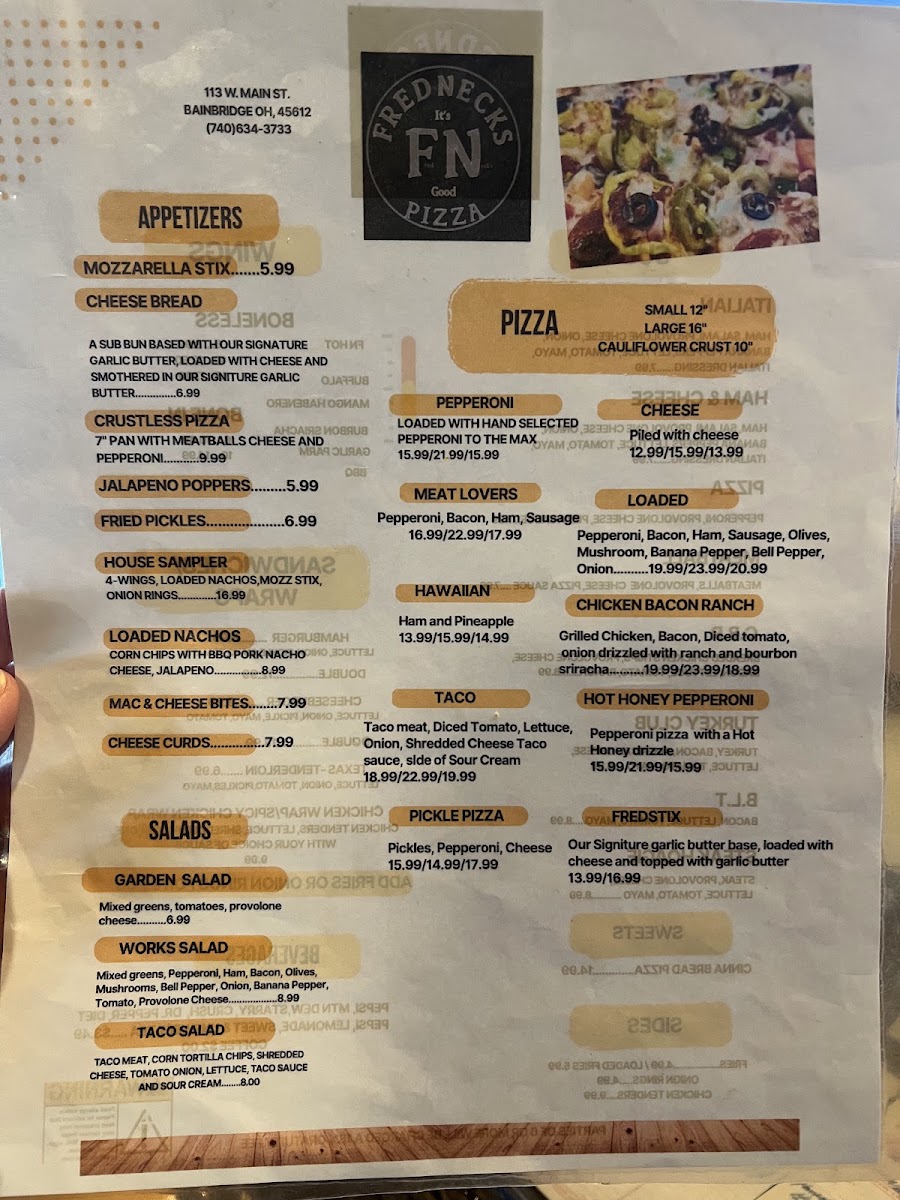 FredNecks Pizza menu board
