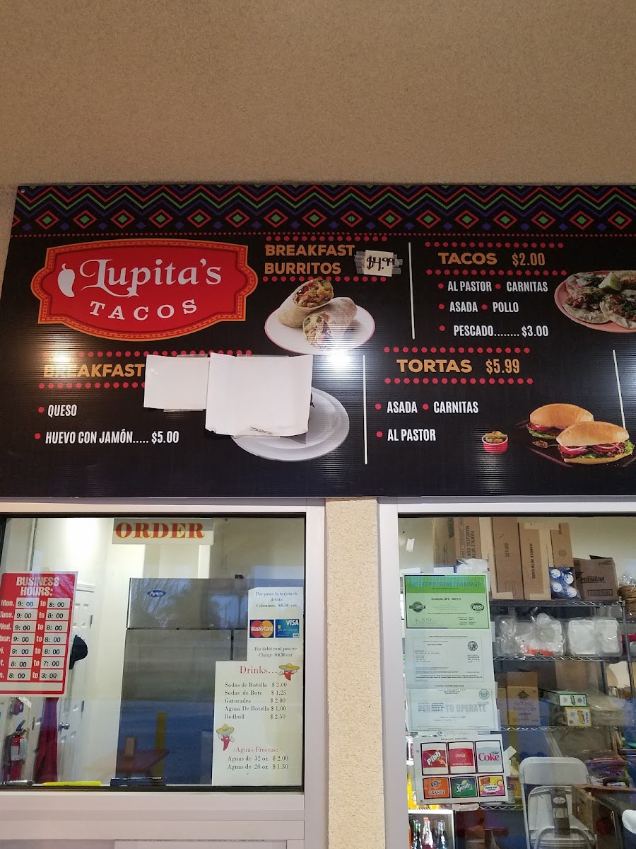 Lupita's Tacos menu board