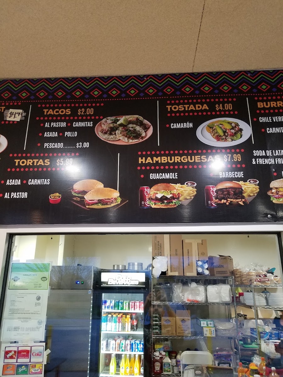 Lupita's Tacos menu board