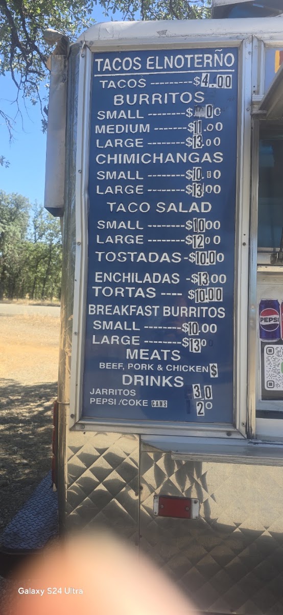 Tacos El Norteño menu board