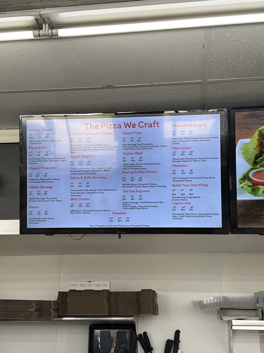 Oak Pantry deli n' Pizza menu board