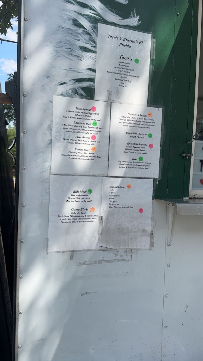 Taco's Y Burrito's El Puebla menu board