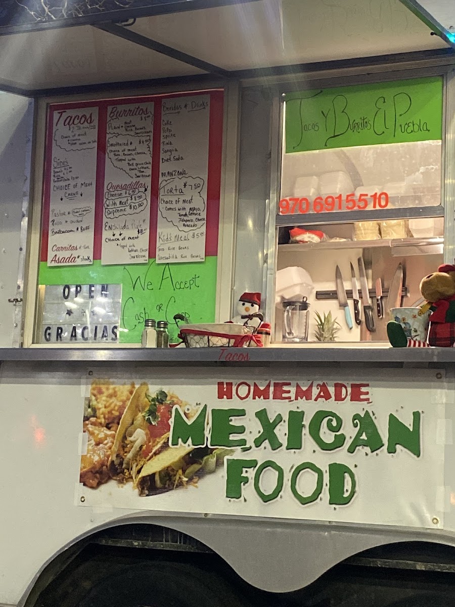 Taco's Y Burrito's El Puebla menu board