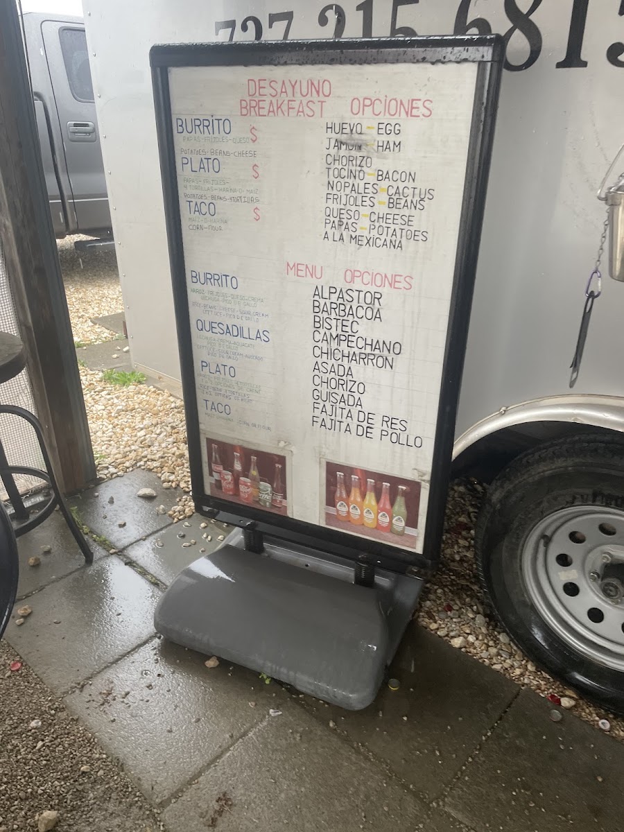 Taqueria El Sazon De Mamá menu board