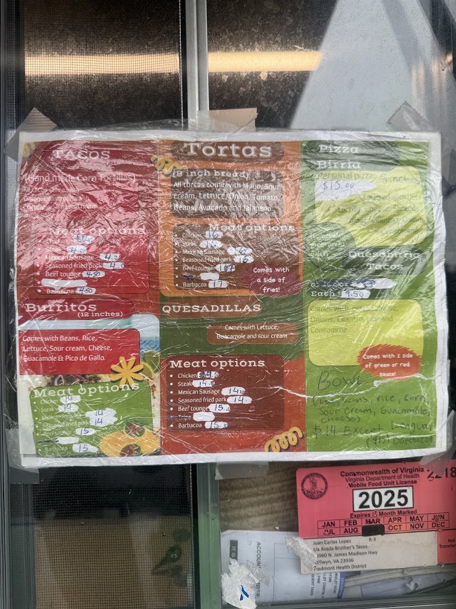Azada Brothers Tacos menu board