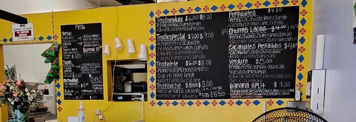 Penas Snowcones Tacos Y Mas menu board