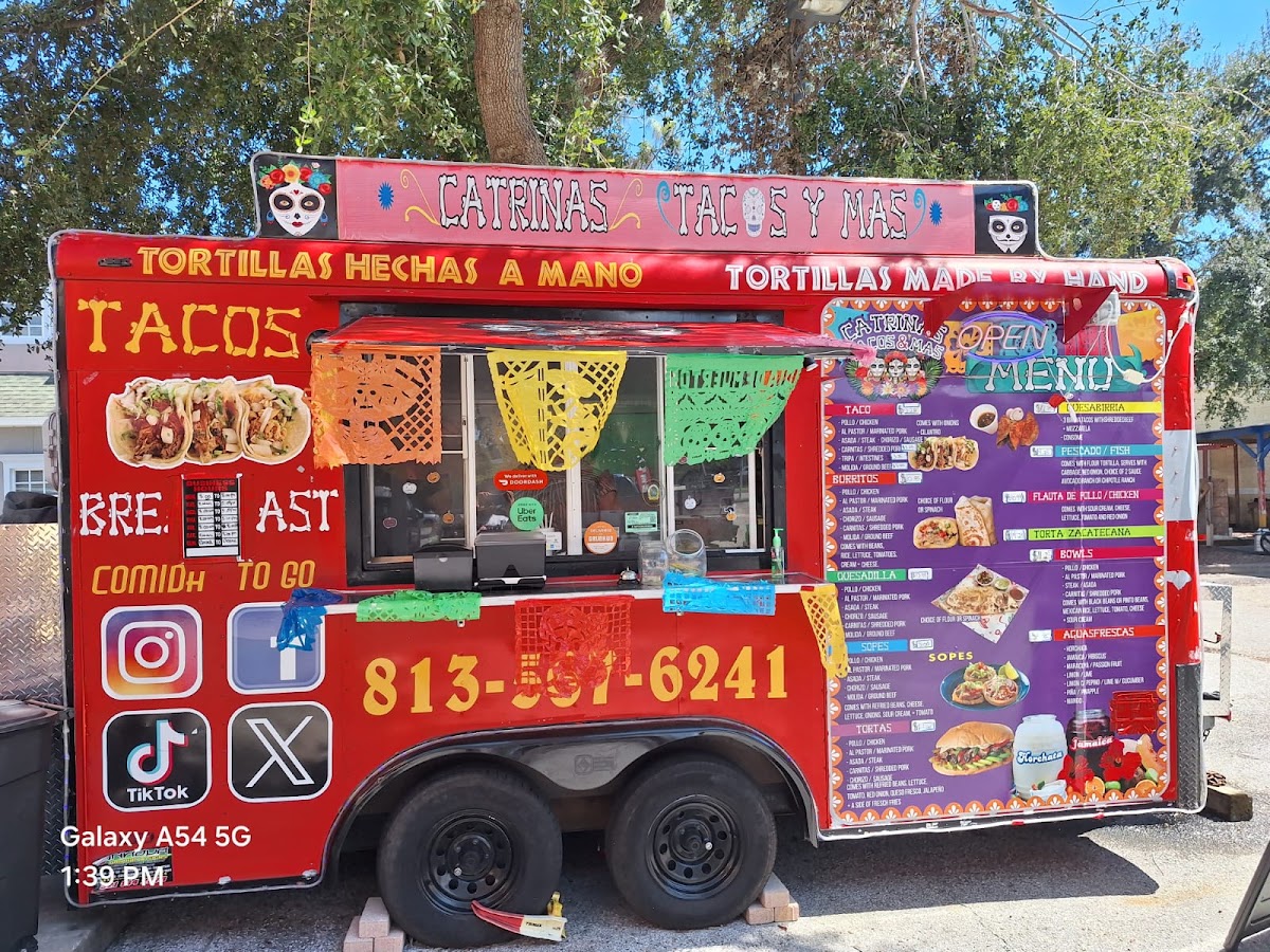 Catrinas Tacos Y Mas menu board