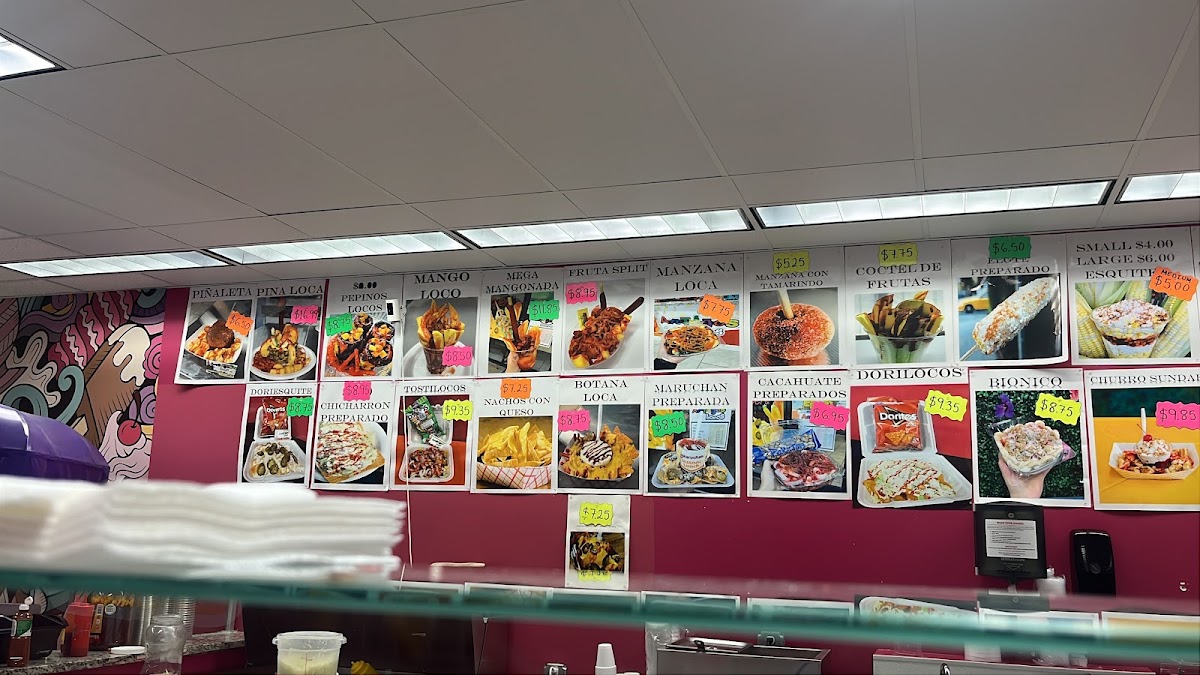 Antojos Locos menu board