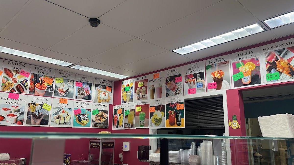 Antojos Locos menu board