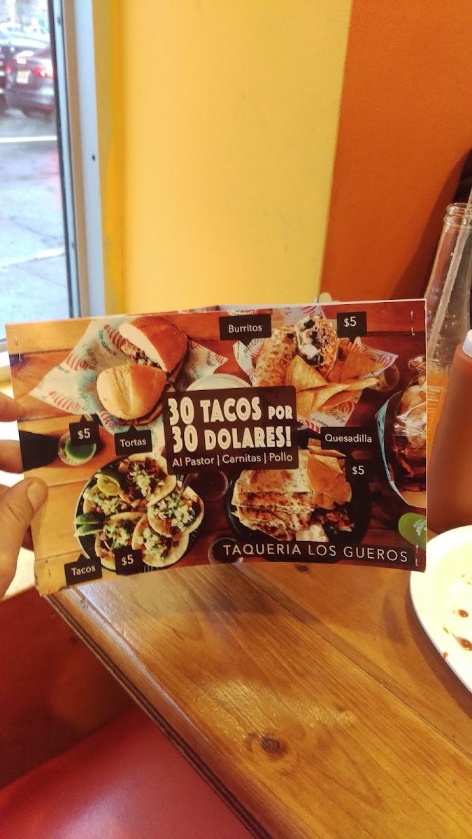 Taqueria Los Güeros menu board