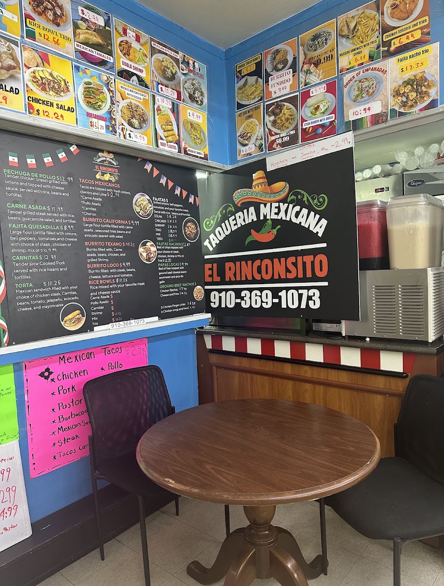 Taqueria mexicana el Rinconsito menu board